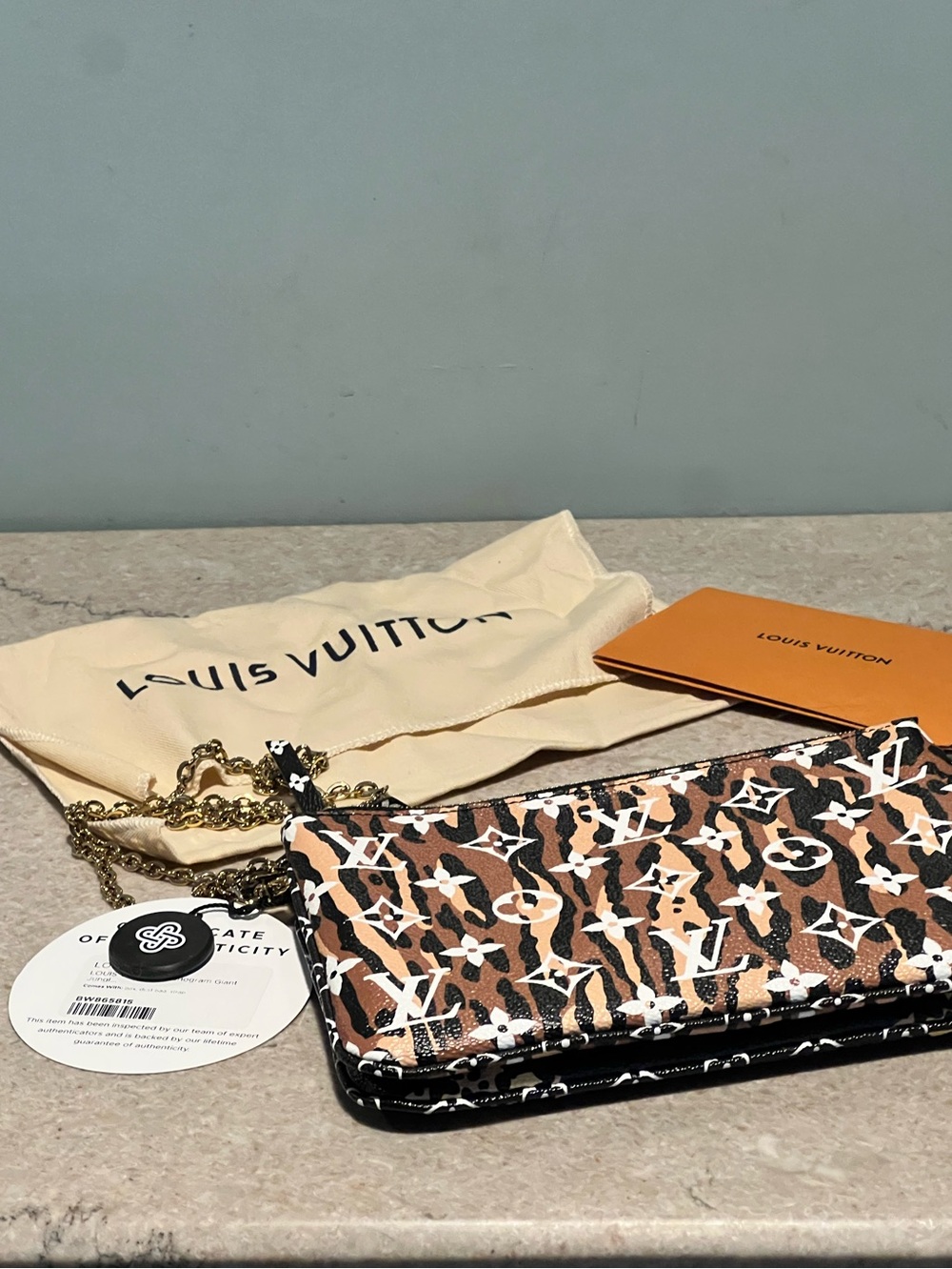 LOUIS VUITTON
Double Zip Jungle Pochette Giant Monogram Leather Crossbody Bag - Picture 12 of 15